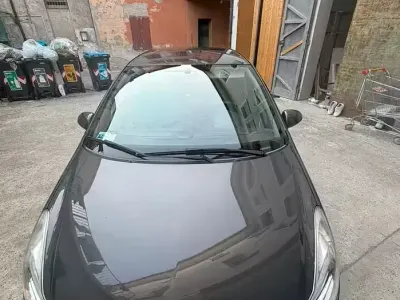 Usata Opel Corsa 54 CV (39 kW) 2013 Grigio Utilitaria