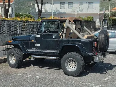 Usata Jeep Wrangler Laredo 103 CV (75 kW) 1983 Nero SUV