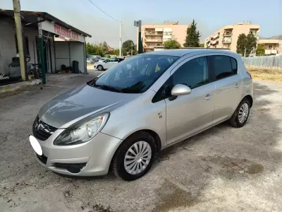 Usata Opel Corsa Edition 75 CV (55 kW) 2010 Grigio Utilitaria
