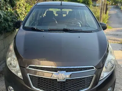 Usata Chevrolet Spark 68 CV (50 kW) 2011 Marrone Utilitaria