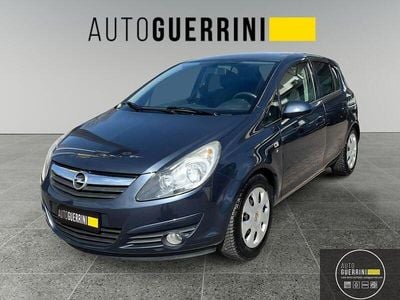 Usado Opel Corsa Edition 95 HP (69 kW) 2011 Cinzento Citadino
