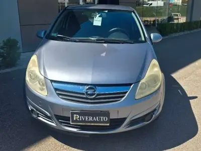 Usado Opel Corsa Enjoy 80 HP (58 kW) 2009 Cinzento Citadino