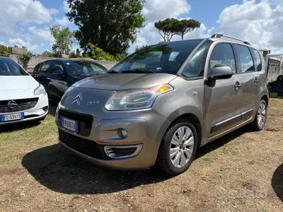 Usado Citroën C3 Picasso Exclusive 92 CV (67 kW) 2012 Amarillo Monovolumen