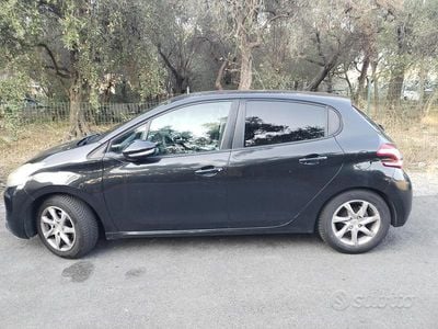 Gebraucht Peugeot 208 68 PS (50 kW) 2012 Schwarz Kleinwagen