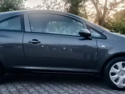 Usado Opel Corsa 85 HP (62 kW) 2013 Cinzento Citadino