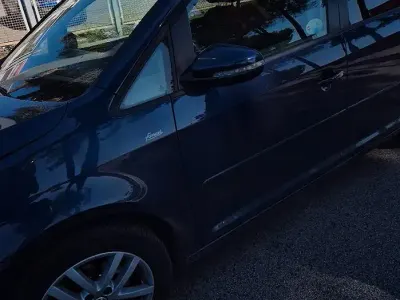 Usata VW Touran 105 CV (77 kW) 2012 Blu Monovolume