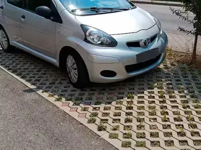 Usata Toyota Aygo 68 CV (50 kW) 2011 Grigio Utilitaria