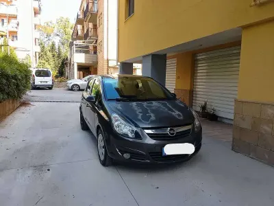 Usata Opel Corsa Edition 75 CV (55 kW) 2010 Grigio Utilitaria
