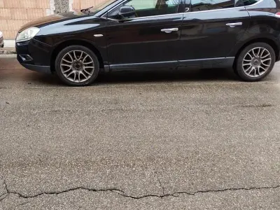 Usata Lancia Delta 120 CV (88 kW) 2011 Nero Utilitaria