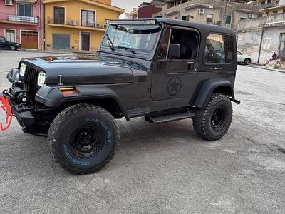 Usata Jeep Wrangler 103 CV (75 kW) 1990 Grigio SUV