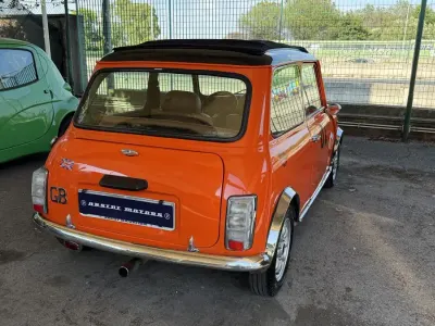Usata Mini Cooper 53 CV (38 kW) 1995 Arancione Utilitaria