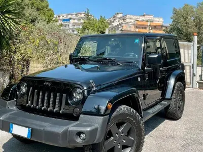 Begagnad Jeep Wrangler Sahara 200 HK (147 kW) 2013 Svart SUV