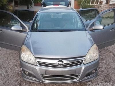 Usata Opel Astra 125 CV (91 kW) 2009 Grigio Station wagon