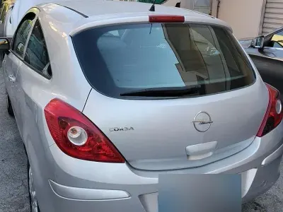 Usata Opel Corsa 60 CV (44 kW) 2009 Grigio Utilitaria