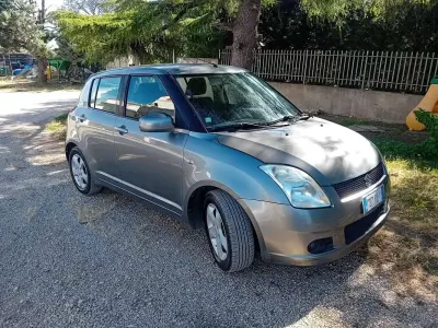 Usata Suzuki Swift GLX 91 CV (66 kW) 2005 Grigio Utilitaria