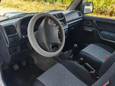 Usata Suzuki Jimny 65 CV (47 kW) 2004 Grigio SUV