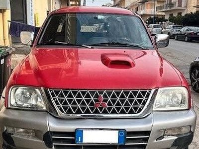 Usata Mitsubishi L200 Invite 115 CV (84 kW) 2005 Rosso Pick-up