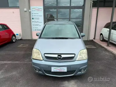 Begagnad Opel Meriva Cosmo 90 HK (66 kW) 2005 Blå Minibuss
