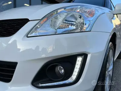 Second-hand Suzuki Swift 75 CP (55 kW) 2013 Alb Hatchback