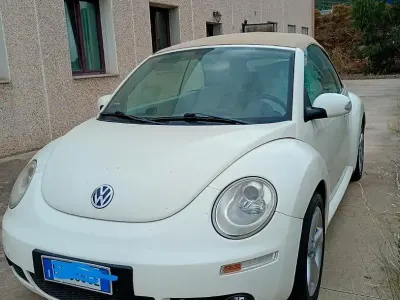 Usata VW New Beetle 105 CV (77 kW) 2009 Bianco Utilitaria