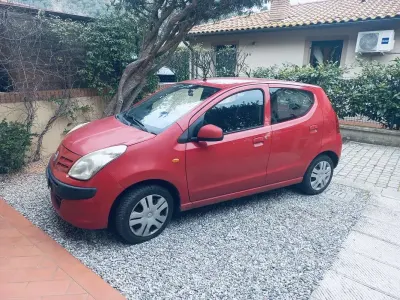 Usata Nissan Pixo 68 CV (50 kW) 2009 Rosso Utilitaria