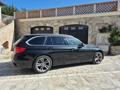 Usata BMW 320 Sport Line 184 CV (135 kW) 2013 Nero Station wagon