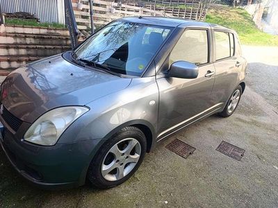 Usata Suzuki Swift GLX 91 CV (66 kW) 2005 Grigio Utilitaria