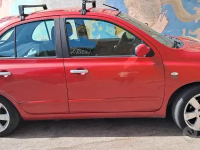 Usata Nissan Micra 78 CV (57 kW) 2010 Rosso Utilitaria