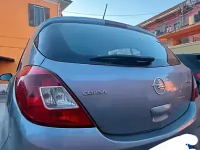 Usata Opel Corsa 69 CV (50 kW) 2009 Grigio Utilitaria