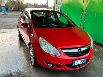 Usata Opel Corsa 80 CV (58 kW) 2009 Rosso Utilitaria