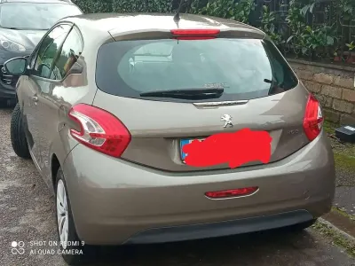 Usata Peugeot 208 Access 68 CV (50 kW) 2013 Bronzo Utilitaria