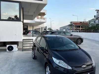 Usado Ford Fiesta Titanium 95 HP (69 kW) 2011 Preto Sedan