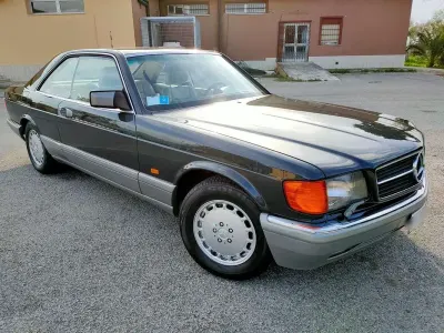 Occasion Mercedes 560 299 ch (219 kW) 1988 Gris Coupé