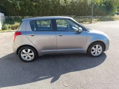 Usata Suzuki Swift 68 CV (50 kW) 2009 Grigio Utilitaria
