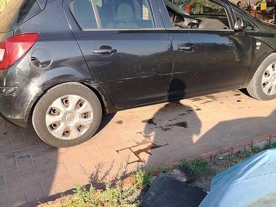 Usata Opel Corsa 69 CV (50 kW) 2010 Nero Berlina