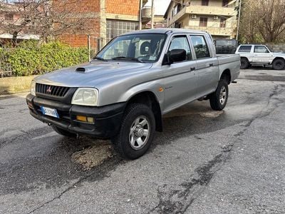 Occasion Mitsubishi L200 100 ch (73 kW) 2001 Argent Pick-up