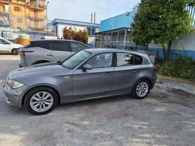 Usata BMW 116 116 CV (85 kW) 2009 Grigio Utilitaria
