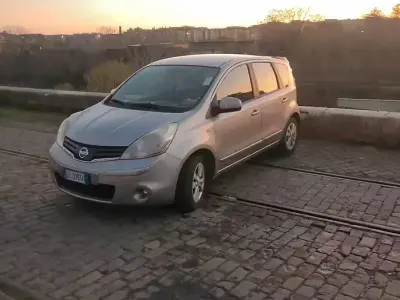 Usata Nissan Note 103 CV (75 kW) 2010 Grigio Utilitaria