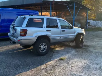 Usata Jeep Grand Cherokee Limited 163 CV (119 kW) 2003 Arancione SUV