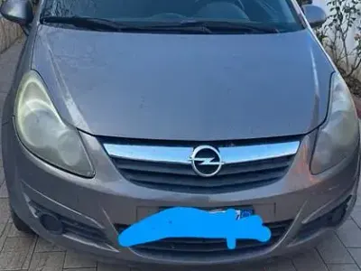 Usata Opel Corsa 65 CV (47 kW) 2011 Marrone Utilitaria