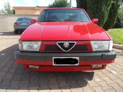 Usata Alfa Romeo 75 165 CV (121 kW) 1991 Rosso Berlina