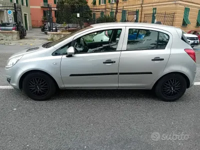 Usado Opel Corsa Enjoy 65 HP (47 kW) 2010 Cinzento Citadino