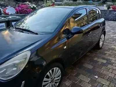 Usata Opel Corsa 95 CV (69 kW) 2012 Nero Utilitaria