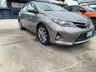 Second-hand Toyota Auris Hybrid Active 99 CP (72 kW) 2013 Auriu Berlinǎ