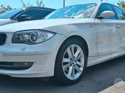 Usata BMW 118 143 CV (105 kW) 2009 Bianco Utilitaria