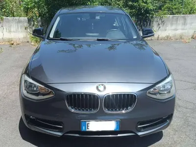 Usata BMW 118 Sport Line 143 CV (105 kW) 2011 Grigio Utilitaria