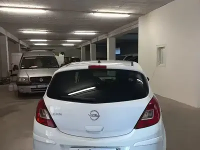Usata Opel Corsa Cosmo 85 CV (62 kW) 2011 Bianco Utilitaria