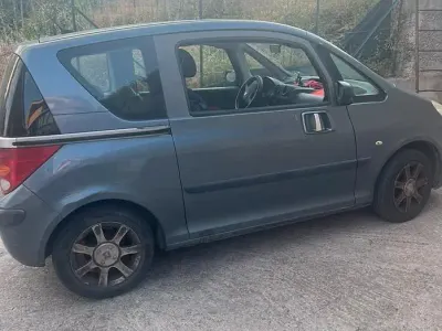 Usata Peugeot 1007 68 CV (50 kW) 2006 Grigio Monovolume