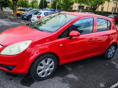 Usata Opel Corsa Enjoy 80 CV (58 kW) 2009 Rosso Utilitaria