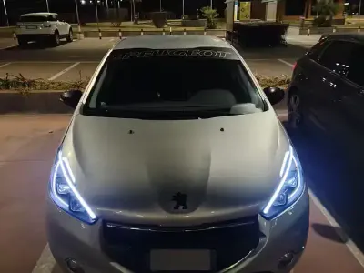 Usata Peugeot 208 68 CV (50 kW) 2012 Grigio Utilitaria